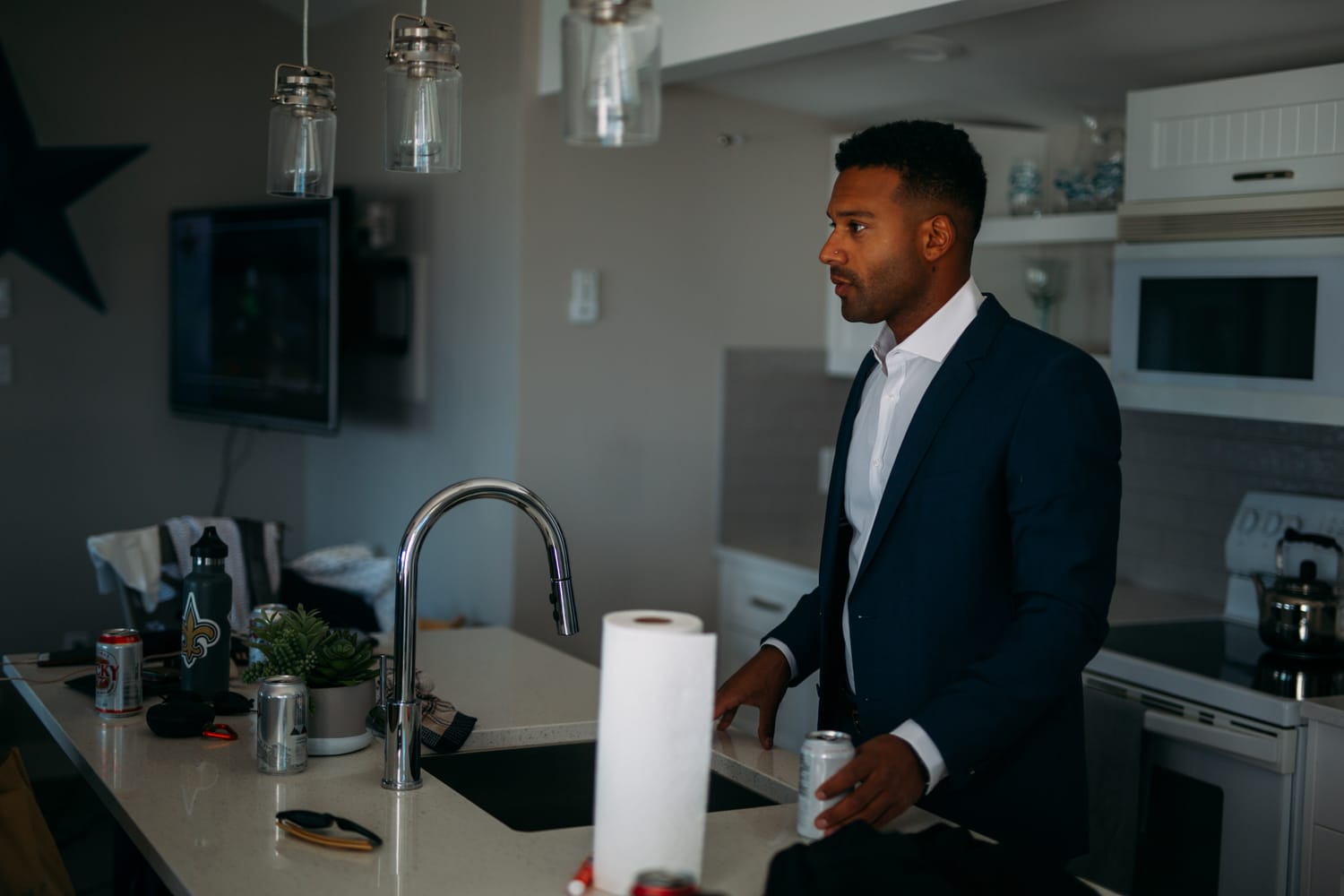 Mara and Casey weddings story frame 8: A Vancouver Island private-home wedding near Qualicum Beach, with Bowser prep, Friday gathering energy, custom vendors, kids, friends and cool Island air..