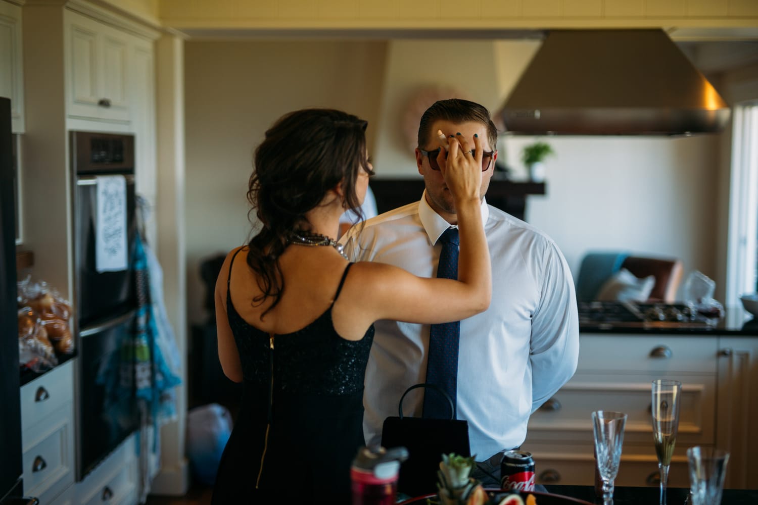 Mara and Casey weddings story frame 15: A Vancouver Island private-home wedding near Qualicum Beach, with Bowser prep, Friday gathering energy, custom vendors, kids, friends and cool Island air..