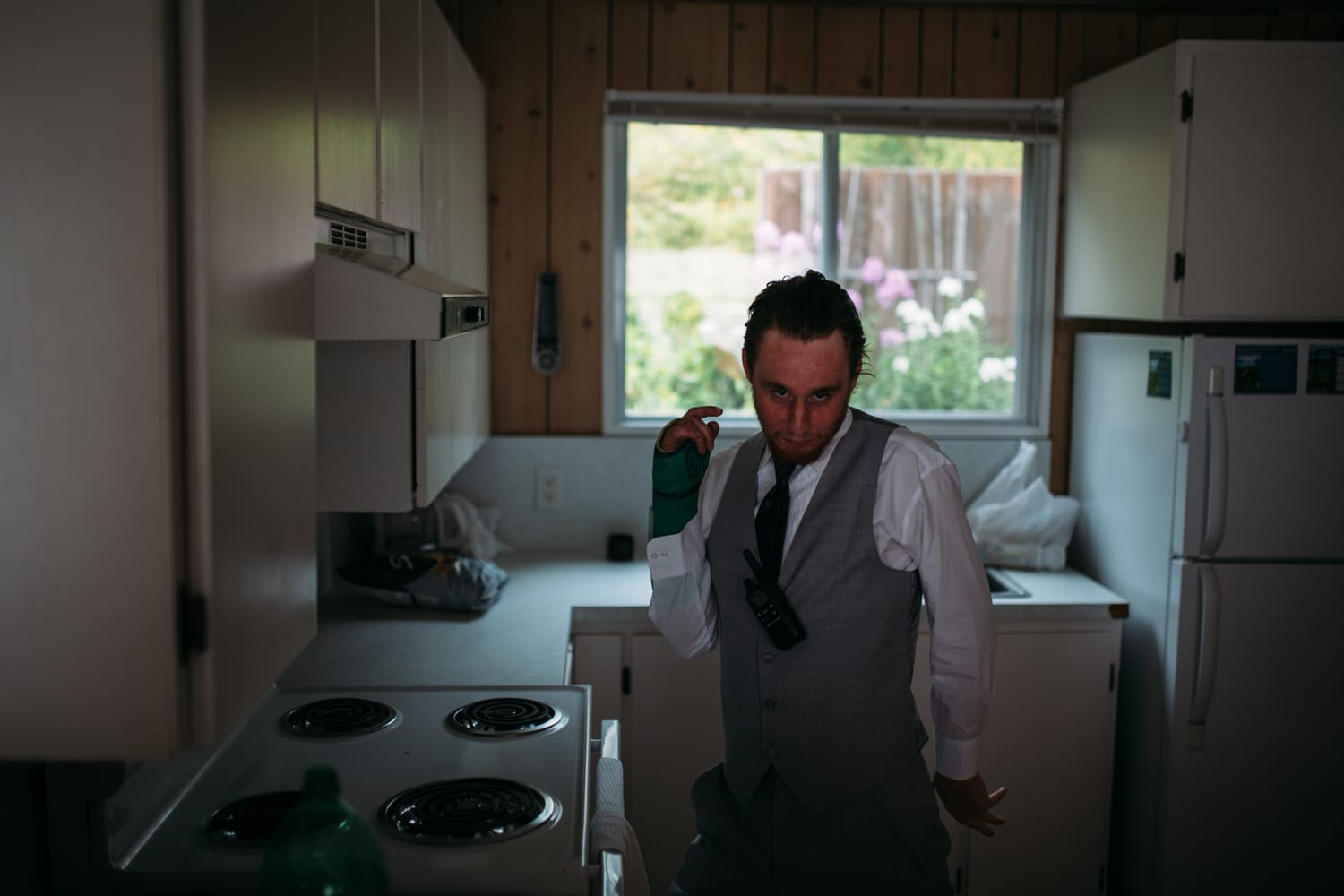 Marie and Mark weddings story frame 5: A Mabel Lake Airpark wedding in the North Okanagan, with grass-runway scenery, open-air photos and sweet family help around makeup, flowers and petals..