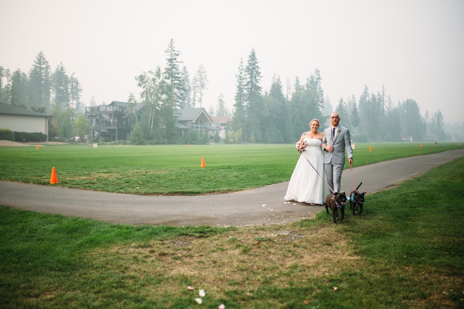 Marie and Mark weddings story frame 14: A Mabel Lake Airpark wedding in the North Okanagan, with grass-runway scenery, open-air photos and sweet family help around makeup, flowers and petals..