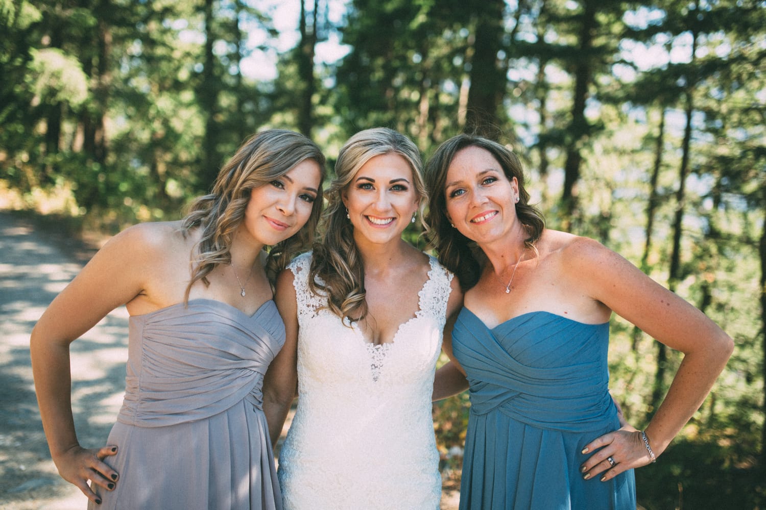 Megan and Jarid weddings story frame 14: A Shuswap-area wedding around Sicamous, Swansea Point and Hyde Mountain, with boat/lake context, cliff portraits and strong floral colour..