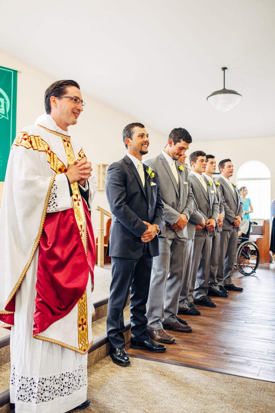 Blaise and his groomsmen lined up inside the church