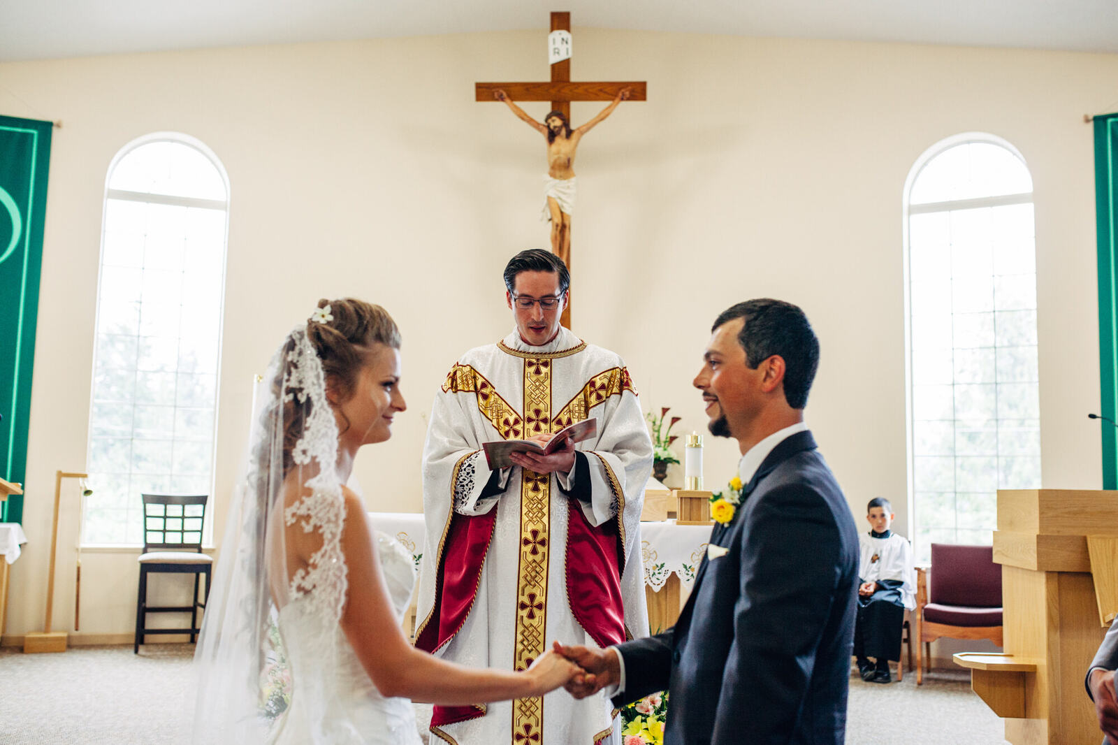 Mel and Blaise standing together during their ceremony
