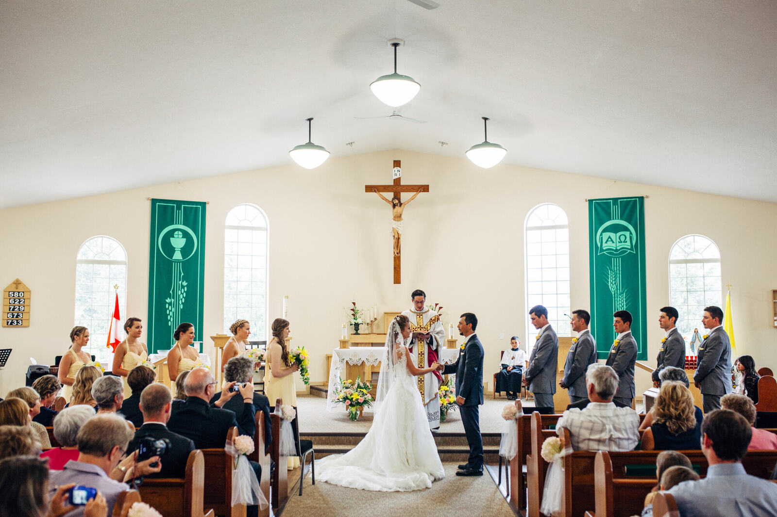 Family and friends watching the wedding ceremony