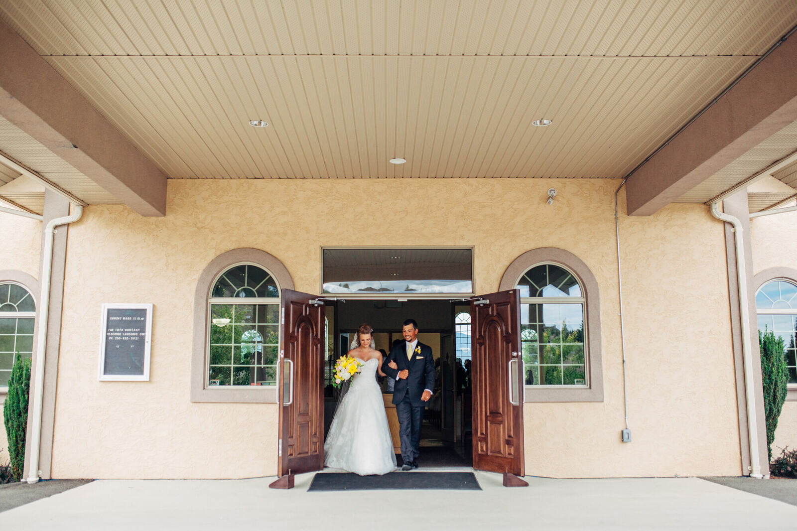 Mel and Blaise leaving the church after their ceremony