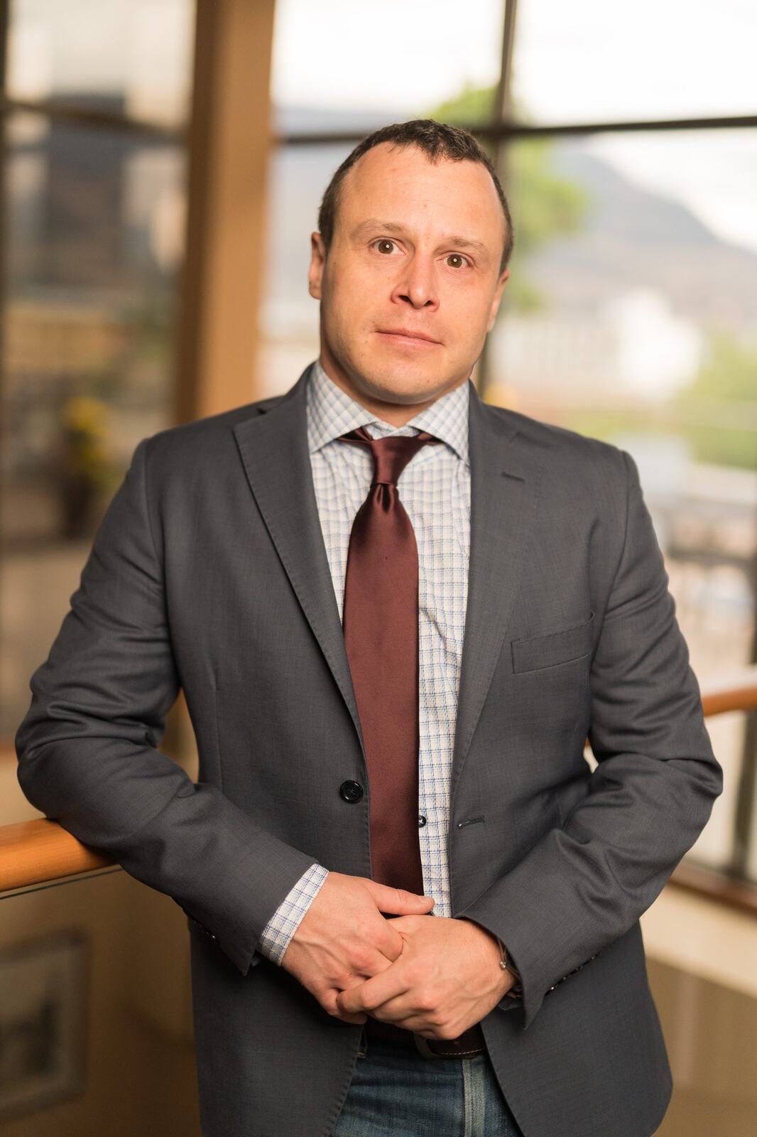 Pushor Mitchell LLP corporate story frame 5: Corporate portraits for Pushor Mitchell LLP in Kelowna, with polished office headshots, approachable legal-team profile images and business photography for a professional law firm..