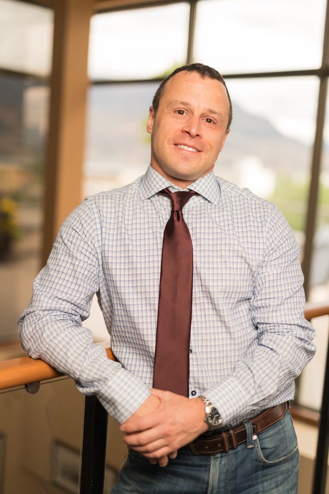 Pushor Mitchell LLP corporate story frame 8: Corporate portraits for Pushor Mitchell LLP in Kelowna, with polished office headshots, approachable legal-team profile images and business photography for a professional law firm..