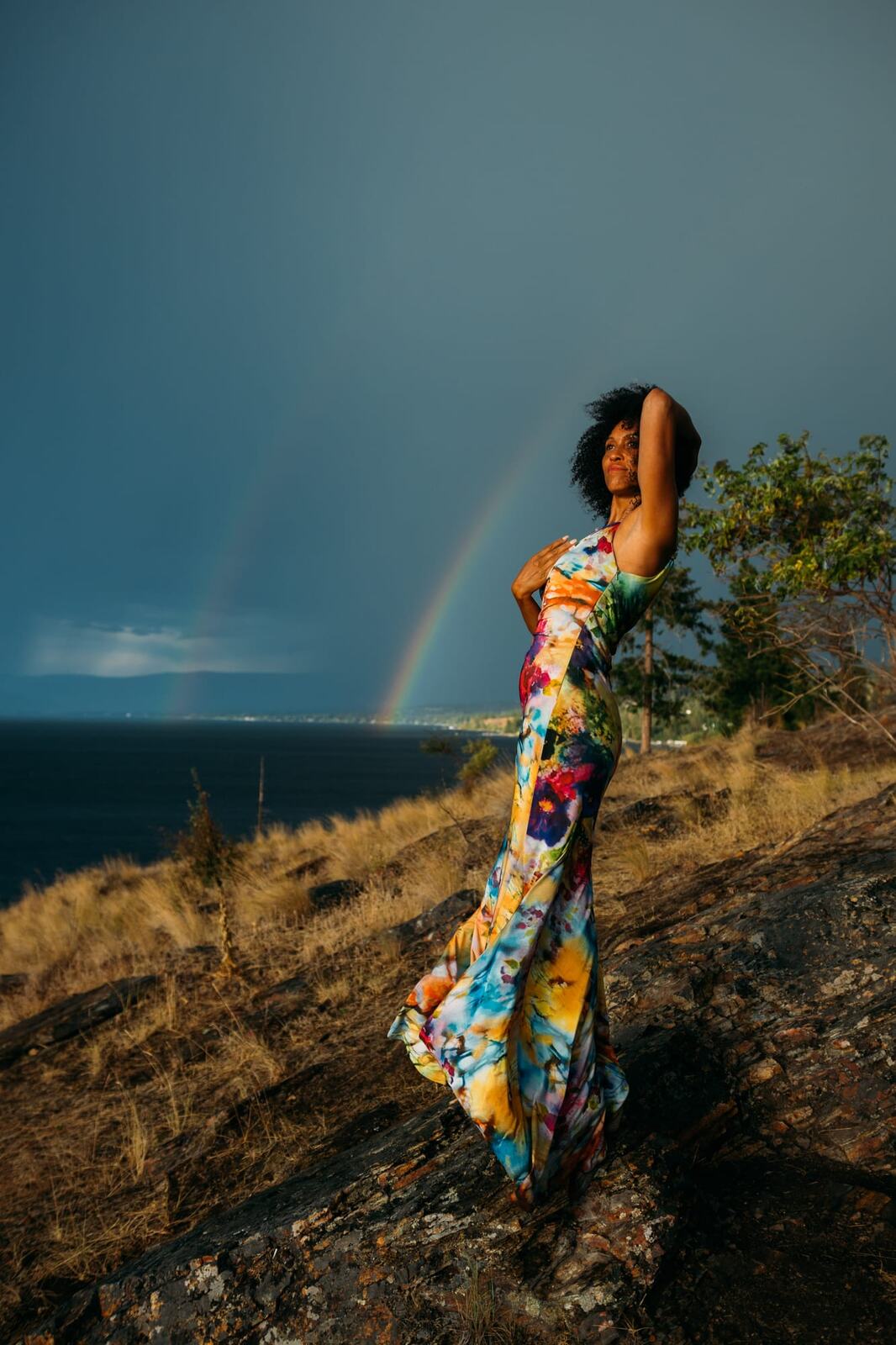 Rebekah at Bertram portraits story frame 5: A Bertram portrait story moving from floral dress and lake light into black dress, white shirt, sunset and water silhouettes.