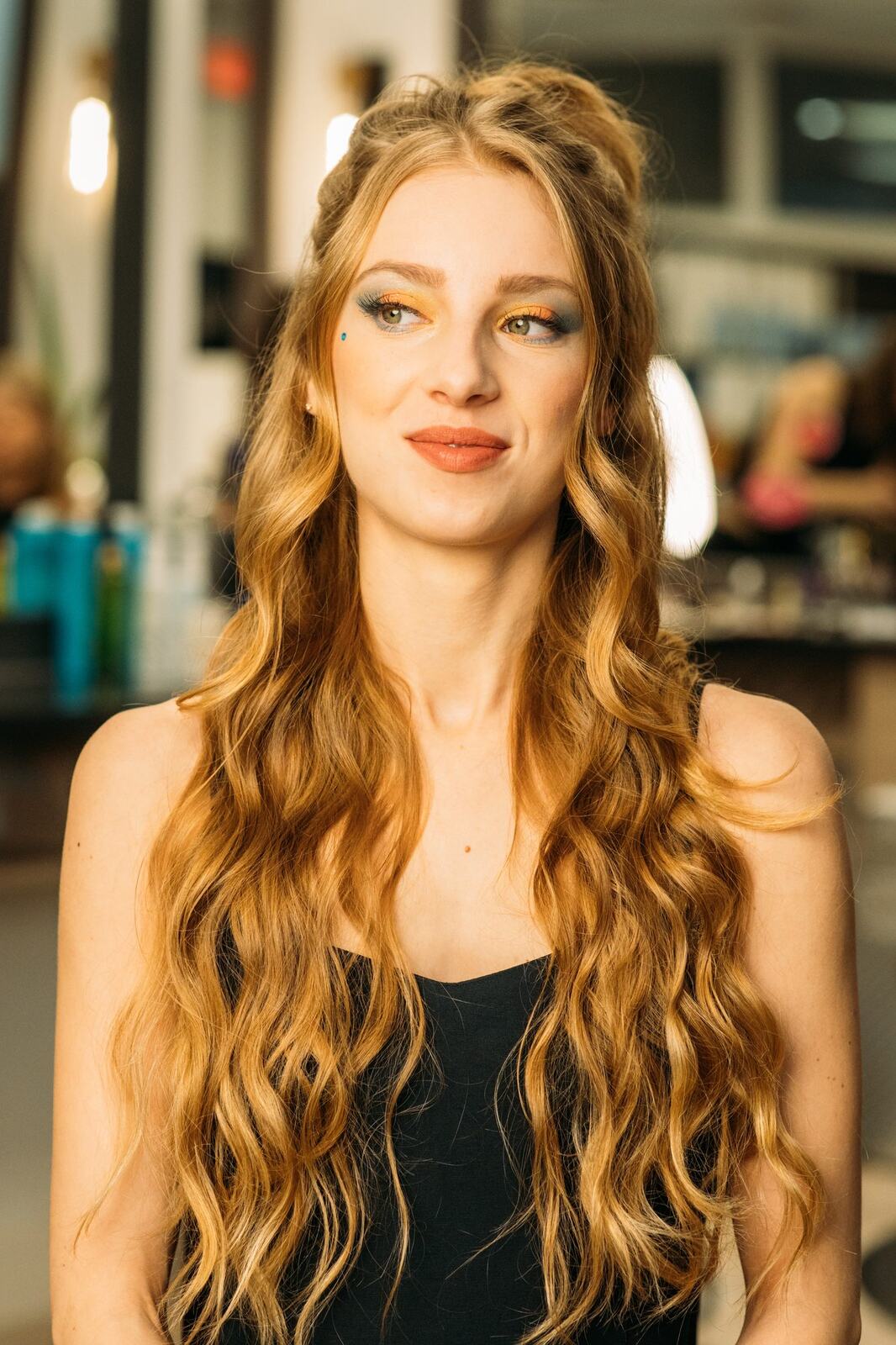 Sass Hair and Diva Den corporate story frame 10: Special-event, prom and grad beauty portraits for Sass Hair and Diva Den in Kelowna, with finished hair, makeup, salon atmosphere and polished vendor images..