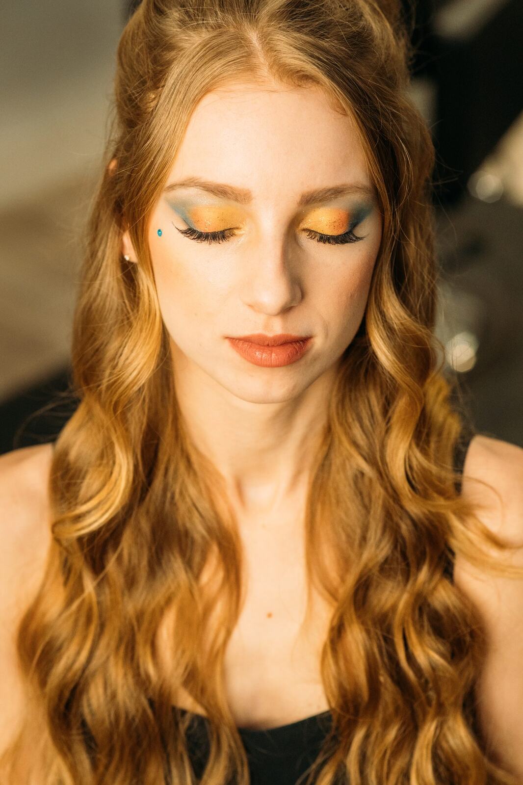 Sass Hair and Diva Den corporate story frame 14: Special-event, prom and grad beauty portraits for Sass Hair and Diva Den in Kelowna, with finished hair, makeup, salon atmosphere and polished vendor images..