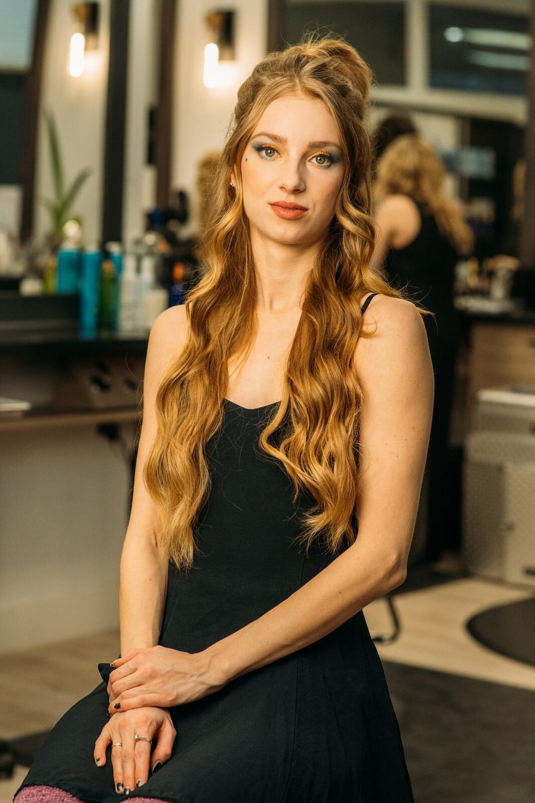 Sass Hair and Diva Den corporate story frame 17: Special-event, prom and grad beauty portraits for Sass Hair and Diva Den in Kelowna, with finished hair, makeup, salon atmosphere and polished vendor images..