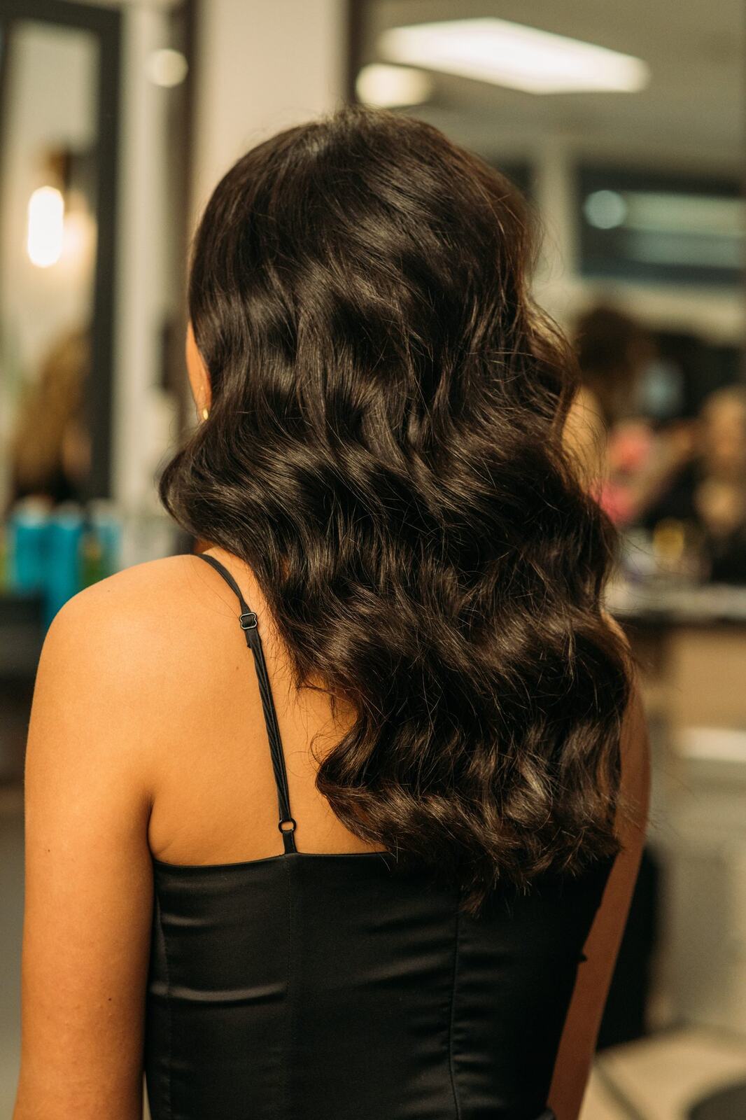 Sass Hair and Diva Den corporate story frame 22: Special-event, prom and grad beauty portraits for Sass Hair and Diva Den in Kelowna, with finished hair, makeup, salon atmosphere and polished vendor images..