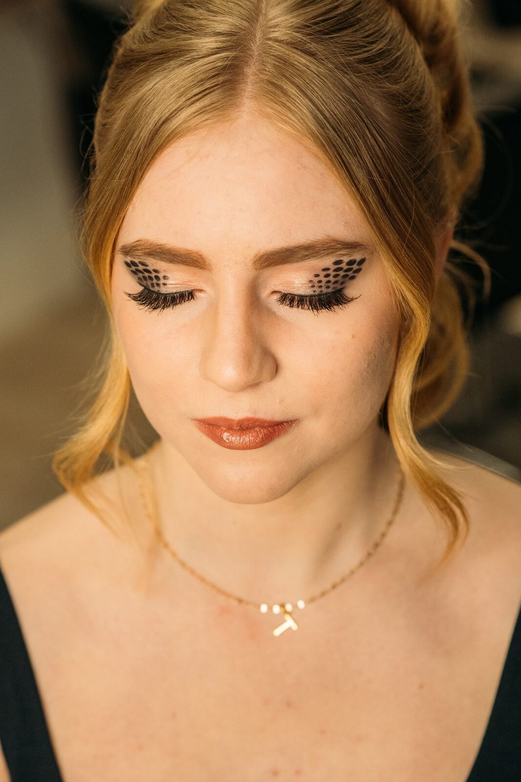 Sass Hair and Diva Den corporate story frame 28: Special-event, prom and grad beauty portraits for Sass Hair and Diva Den in Kelowna, with finished hair, makeup, salon atmosphere and polished vendor images..
