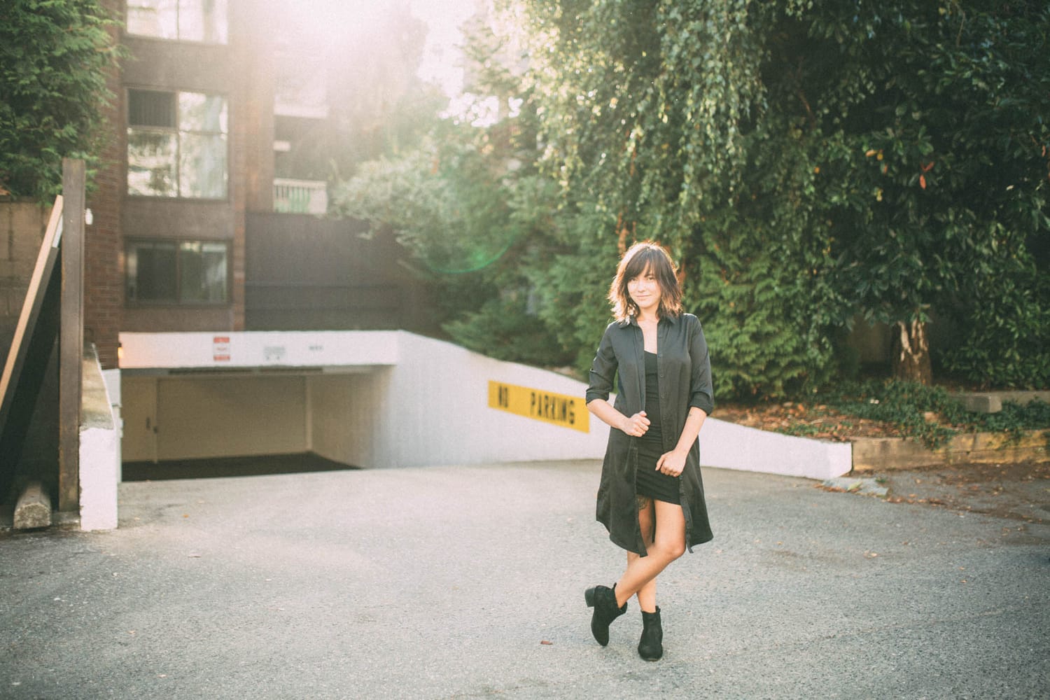 Savannah in Vancouver portraits story frame 13: Vancouver portraits for Savannah with pale walls, green city paths, soft street light and a gentle late-afternoon portrait rhythm.