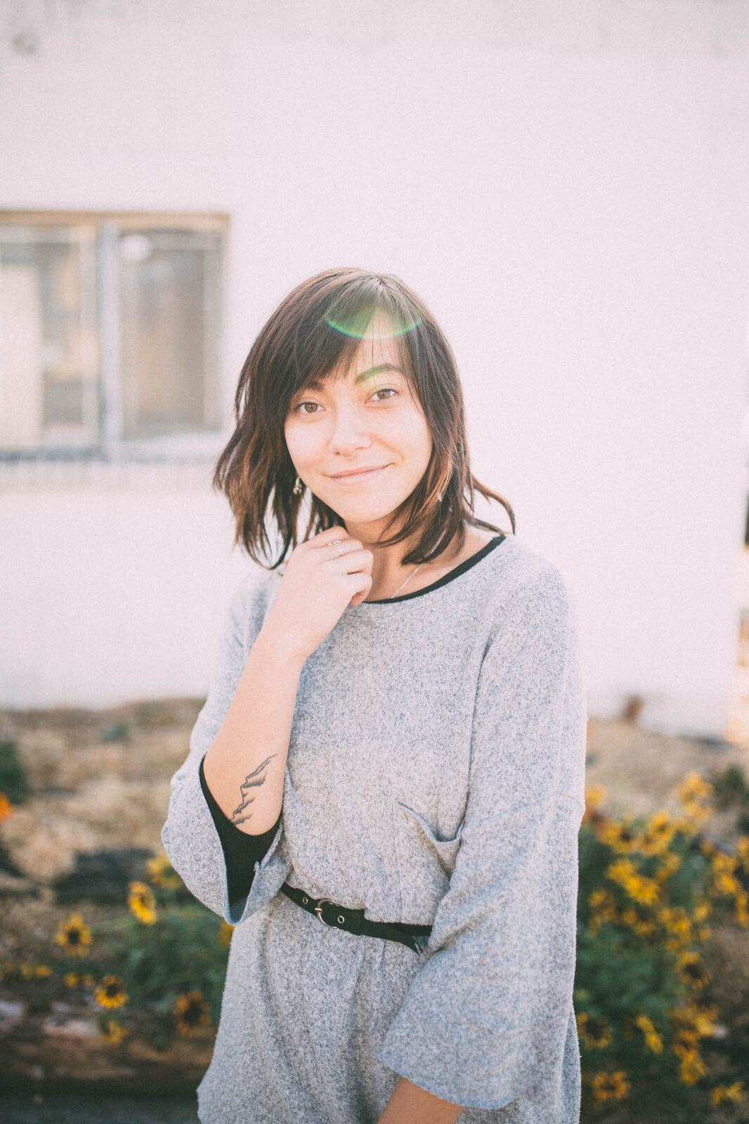 Savannah in Vancouver portraits story frame 18: Vancouver portraits for Savannah with pale walls, green city paths, soft street light and a gentle late-afternoon portrait rhythm.