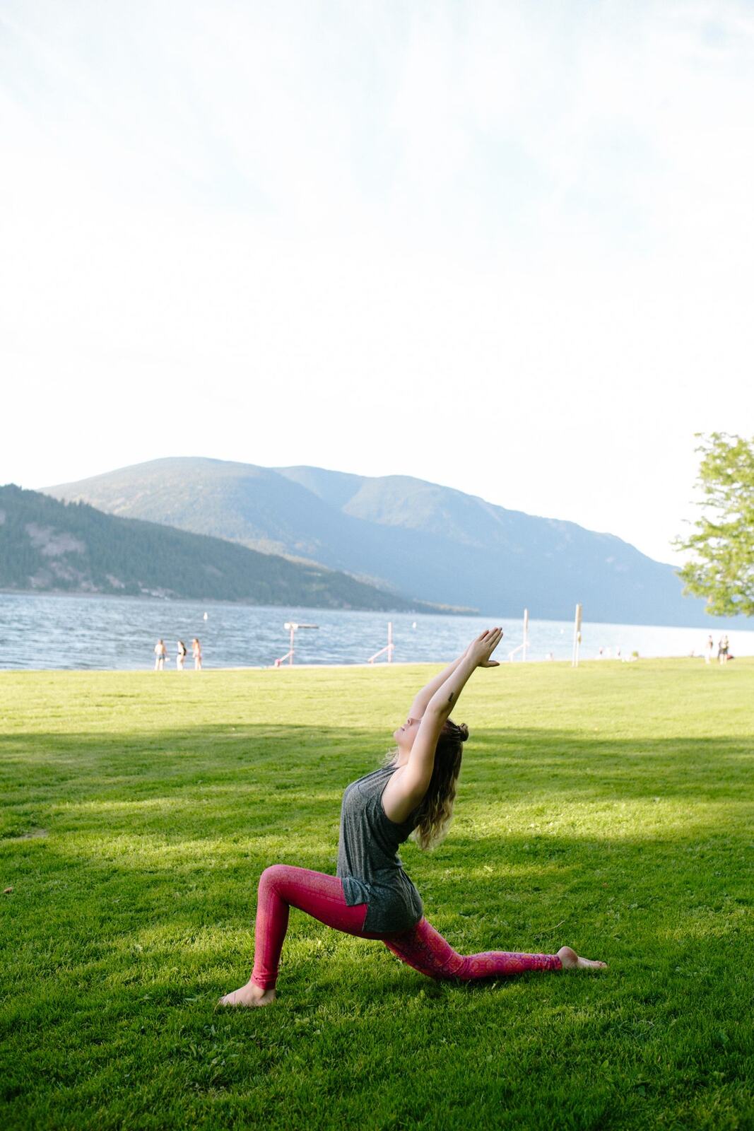 Shani Yoga corporate story frame 1: Wellness portraits for Shani with yoga movement, shoreline light and wooded settings, created for a personal brand with an active outdoor focus.