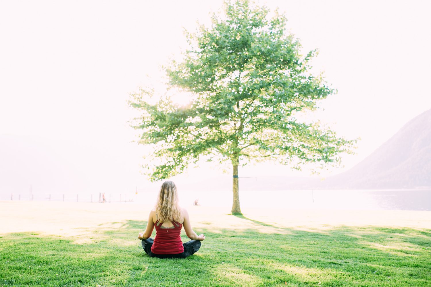 Shani Yoga corporate story frame 9: Wellness portraits for Shani with yoga movement, shoreline light and wooded settings, created for a personal brand with an active outdoor focus.