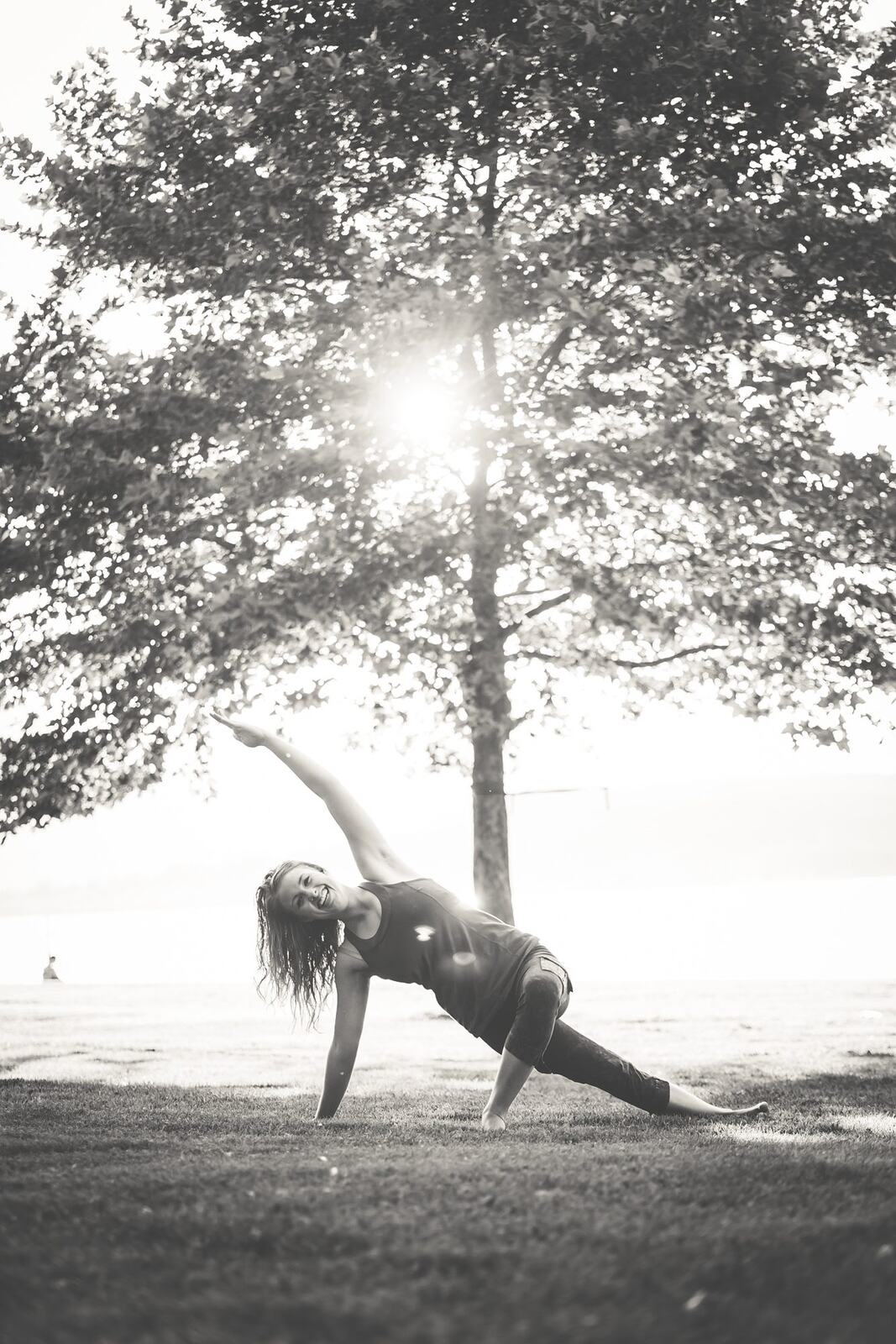 Shani Yoga corporate story frame 13: Wellness portraits for Shani with yoga movement, shoreline light and wooded settings, created for a personal brand with an active outdoor focus.