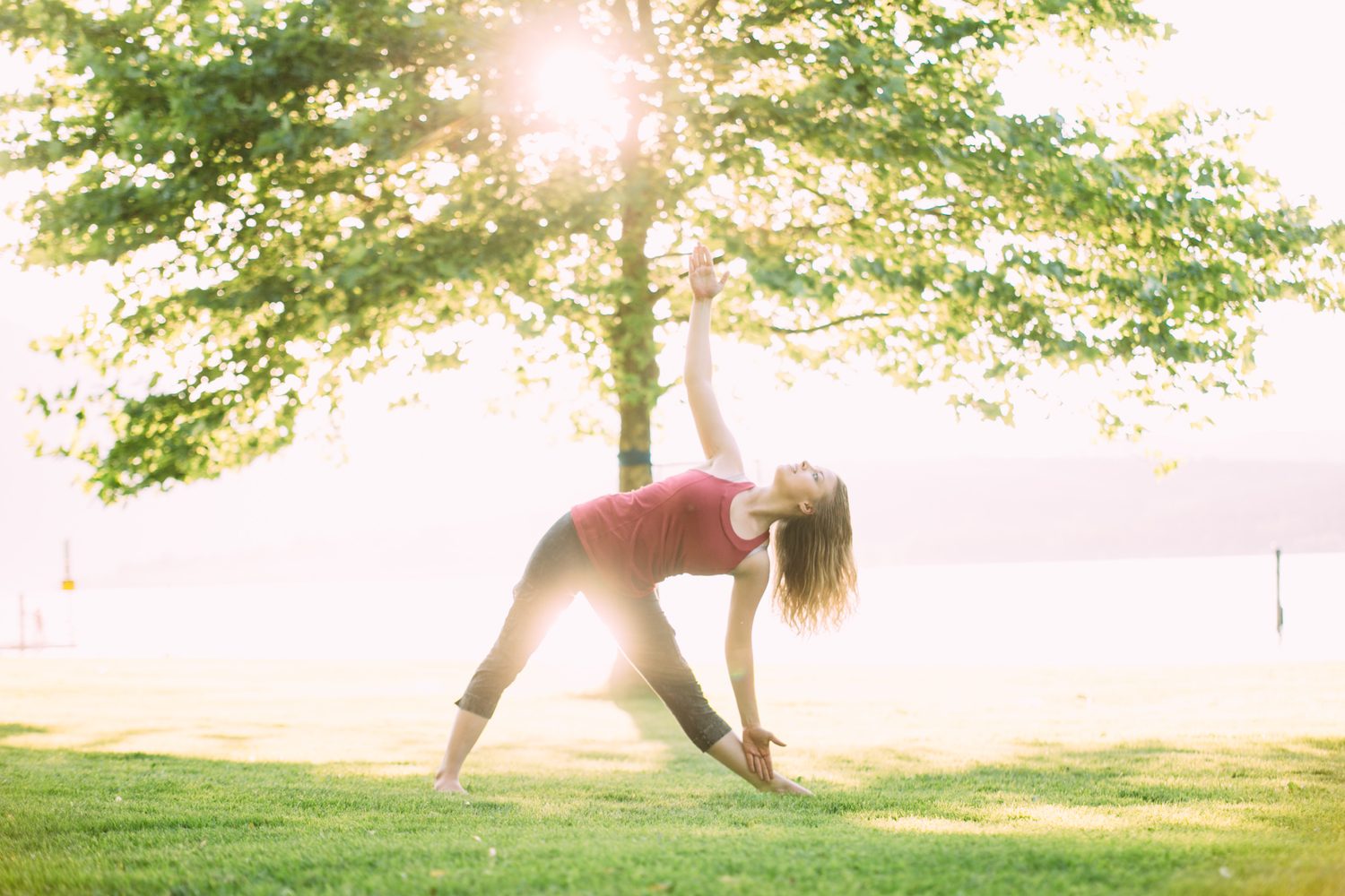 Shani Yoga corporate story frame 15: Wellness portraits for Shani with yoga movement, shoreline light and wooded settings, created for a personal brand with an active outdoor focus.