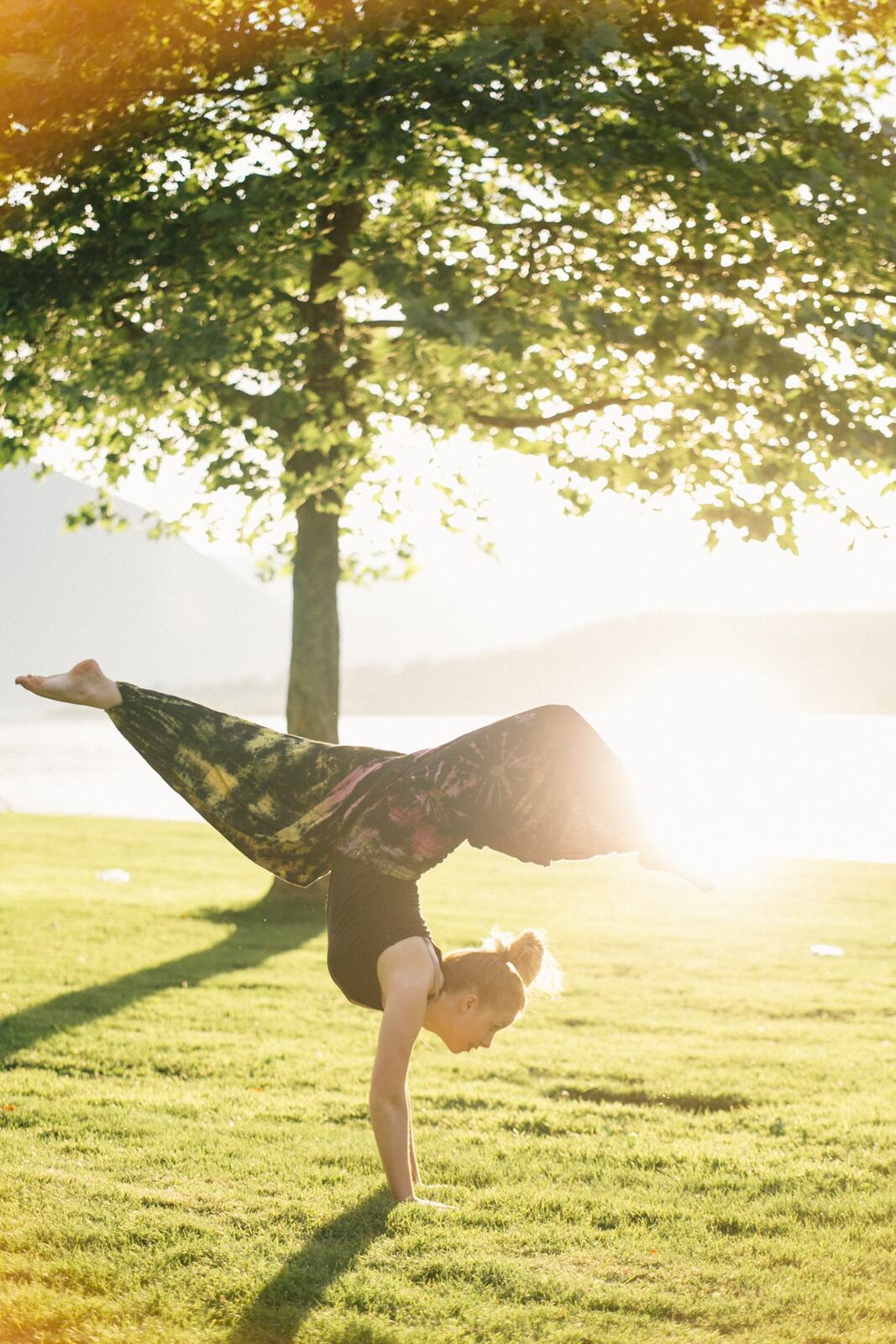 Shani Yoga corporate story frame 21: Wellness portraits for Shani with yoga movement, shoreline light and wooded settings, created for a personal brand with an active outdoor focus.