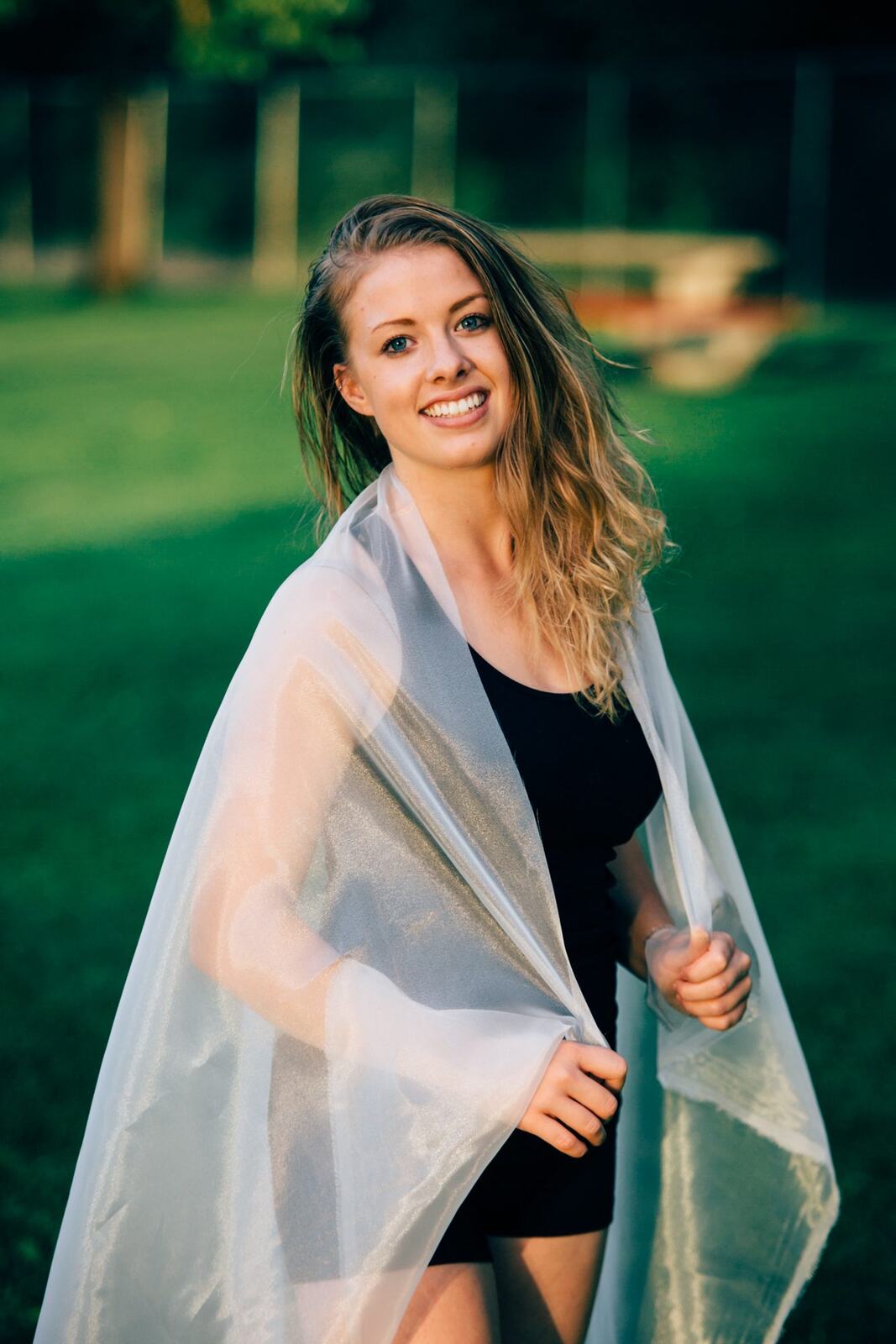 Shani Yoga corporate story frame 25: Wellness portraits for Shani with yoga movement, shoreline light and wooded settings, created for a personal brand with an active outdoor focus.