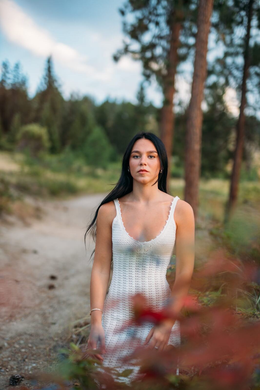 Shaylin at Bertram portraits story frame 7: A large Bertram session with water, green shade, outfit changes and Okanagan location detail that gives the story a clear place.