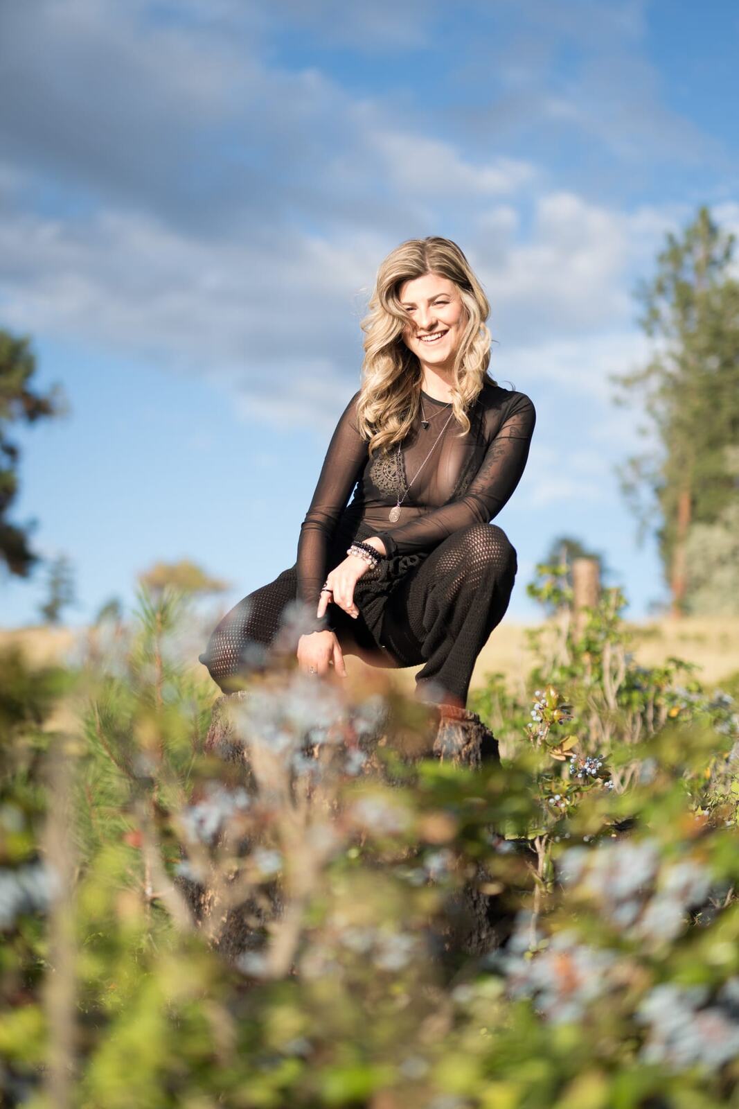 Sophia by the Water and Trees portraits story frame 3: Black outfits, water, trees, swimwear and a confident, sensual portrait story.