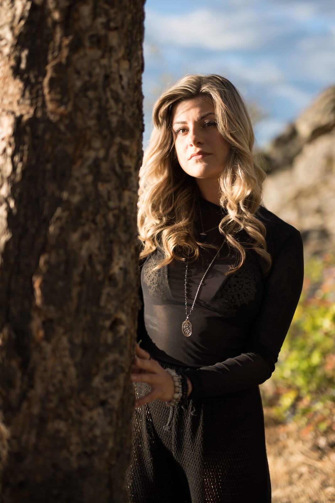 Sophia by the Water and Trees portraits story frame 4: Black outfits, water, trees, swimwear and a confident, sensual portrait story.