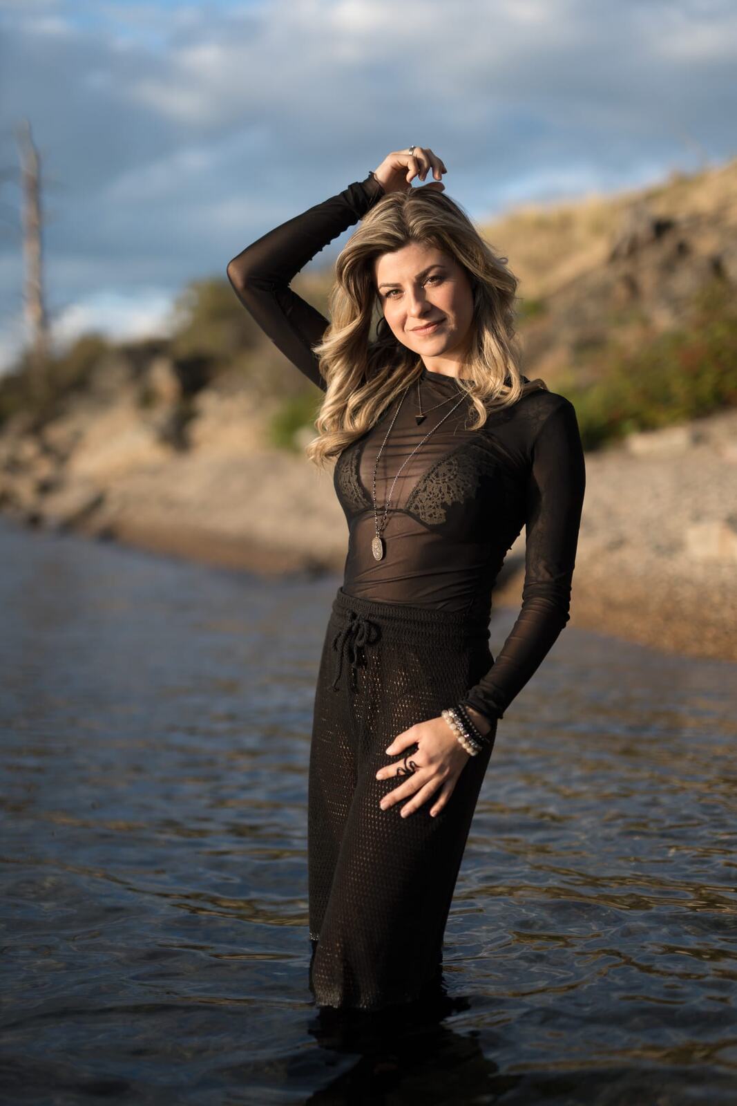 Sophia by the Water and Trees portraits story frame 10: Black outfits, water, trees, swimwear and a confident, sensual portrait story.