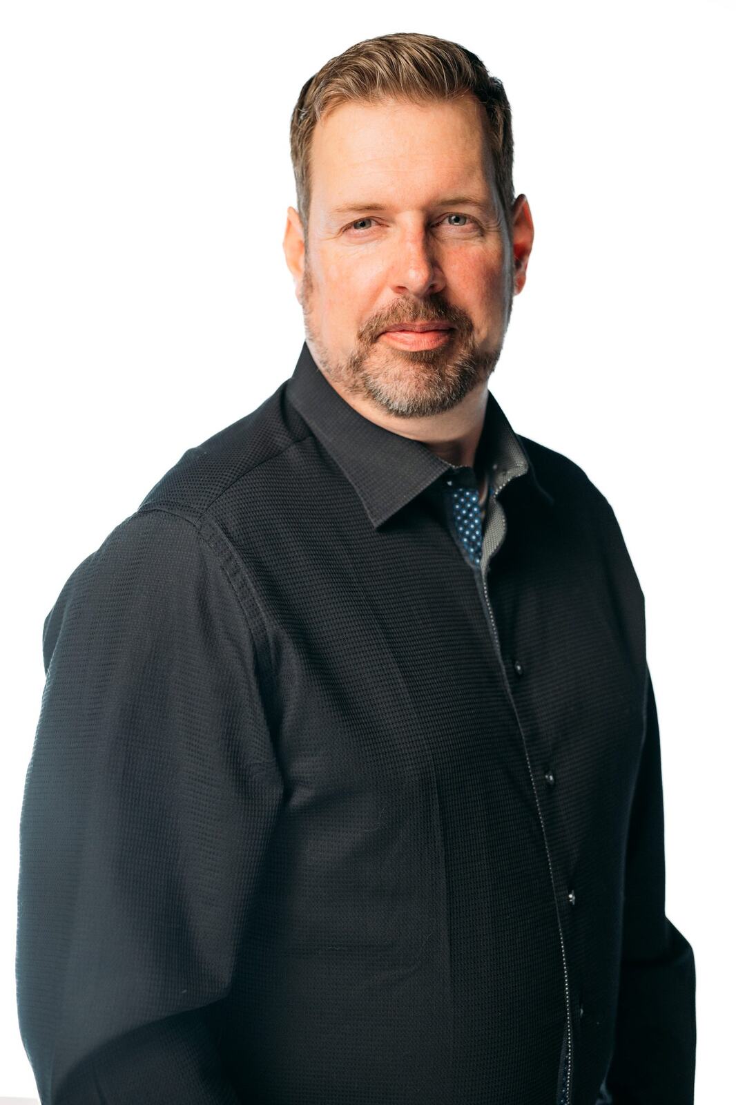 Team Bennett corporate story frame 8: Real estate team portraits in Kelowna, with individual headshots, group photos and clean marketing images for profiles, listings and business use..