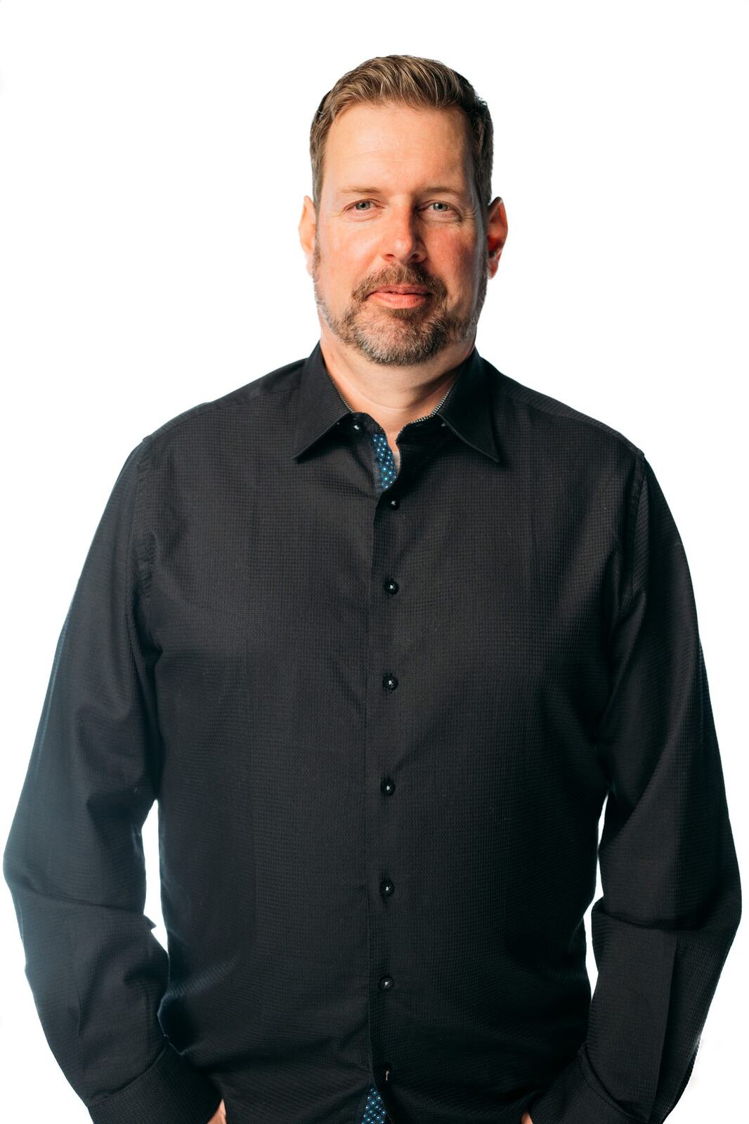 Team Bennett corporate story frame 9: Real estate team portraits in Kelowna, with individual headshots, group photos and clean marketing images for profiles, listings and business use..