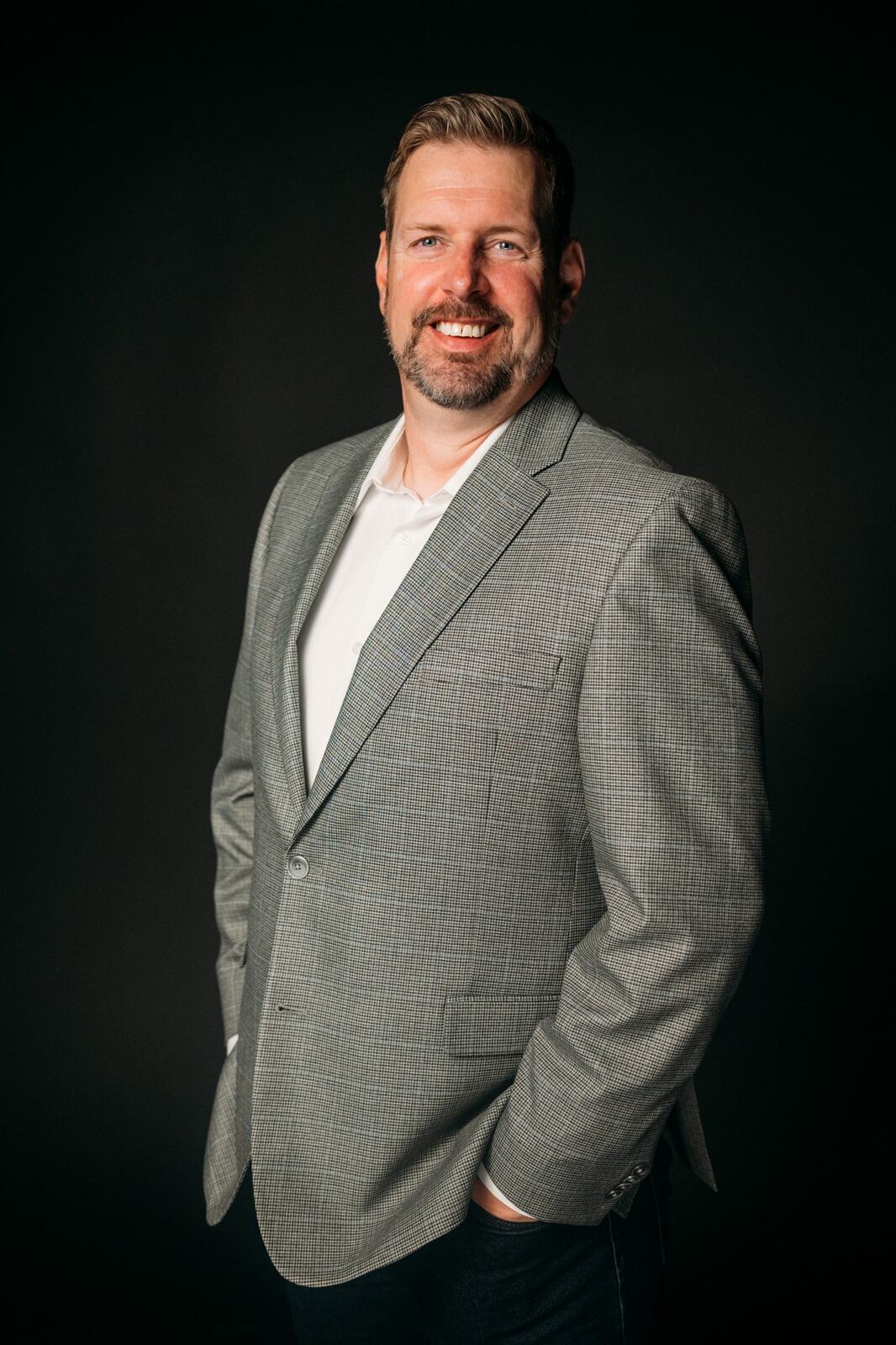 Team Bennett corporate story frame 15: Real estate team portraits in Kelowna, with individual headshots, group photos and clean marketing images for profiles, listings and business use..
