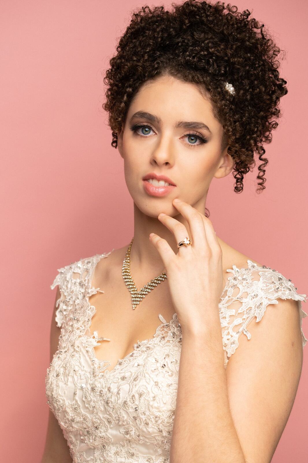 The Barbershoppe / Diva Den Bridal Formals corporate story frame 2: Collaborative bridal-formal brand photography for The Barbershoppe and Diva Den Day Spa, with hair, makeup, formal looks, studio portraits and campaign-ready beauty imagery..
