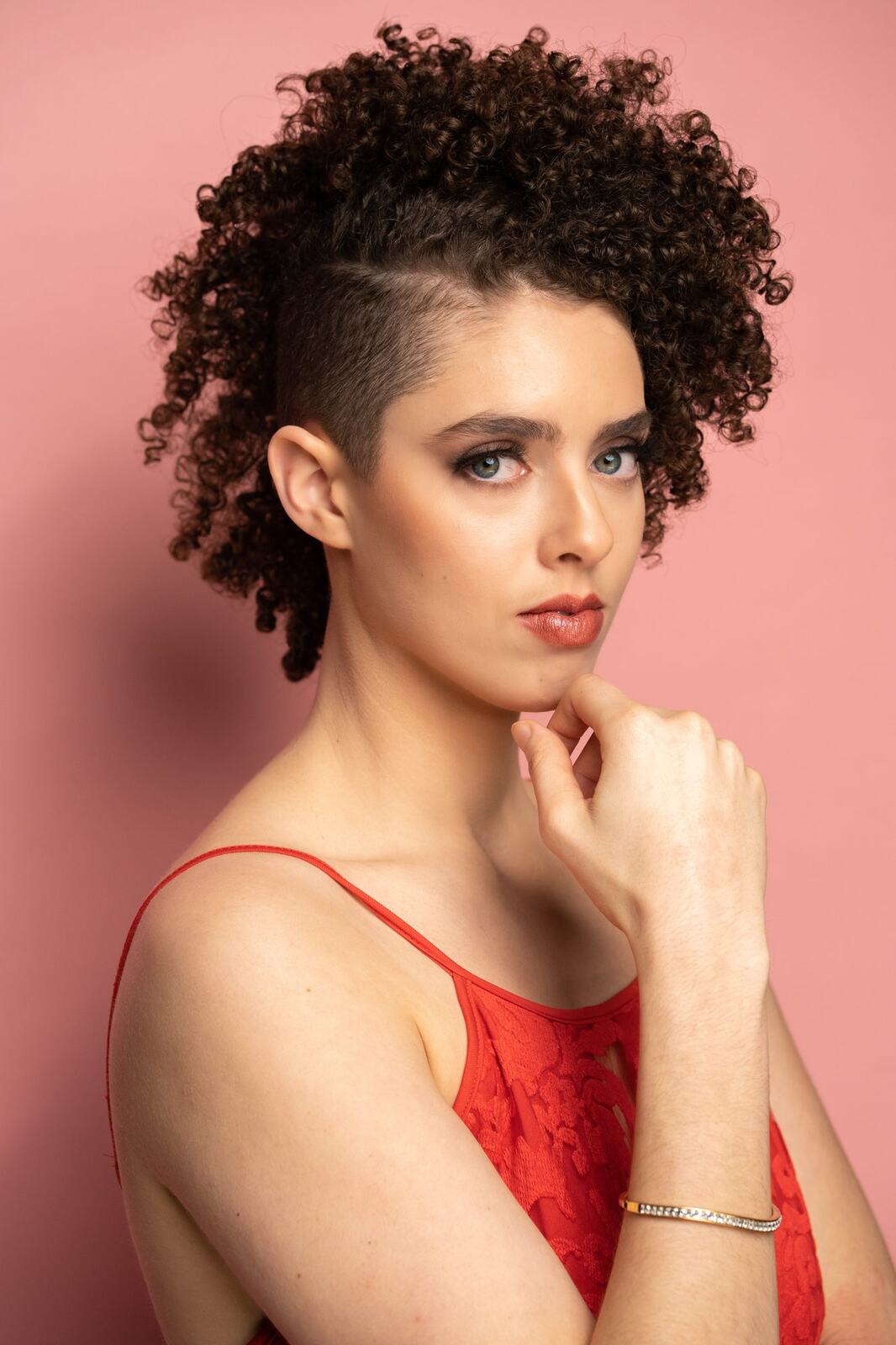 The Barbershoppe / Diva Den Bridal Formals corporate story frame 10: Collaborative bridal-formal brand photography for The Barbershoppe and Diva Den Day Spa, with hair, makeup, formal looks, studio portraits and campaign-ready beauty imagery..