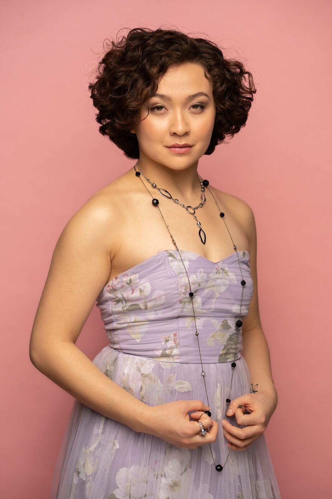 The Barbershoppe / Diva Den Bridal Formals corporate story frame 14: Collaborative bridal-formal brand photography for The Barbershoppe and Diva Den Day Spa, with hair, makeup, formal looks, studio portraits and campaign-ready beauty imagery..