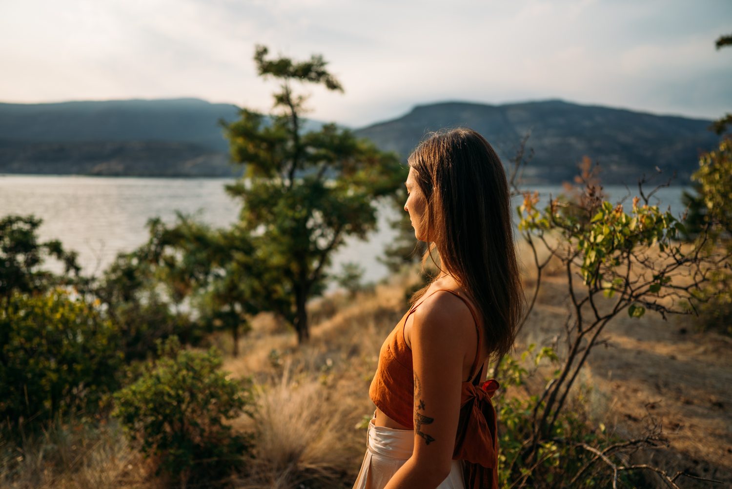 The Living Narrative, Sol corporate story frame 1: Personal-brand photography for The Living Narrative in Kelowna, with Sol in warm Okanagan light, lakeside portrait range and profile-ready images for creative business use..