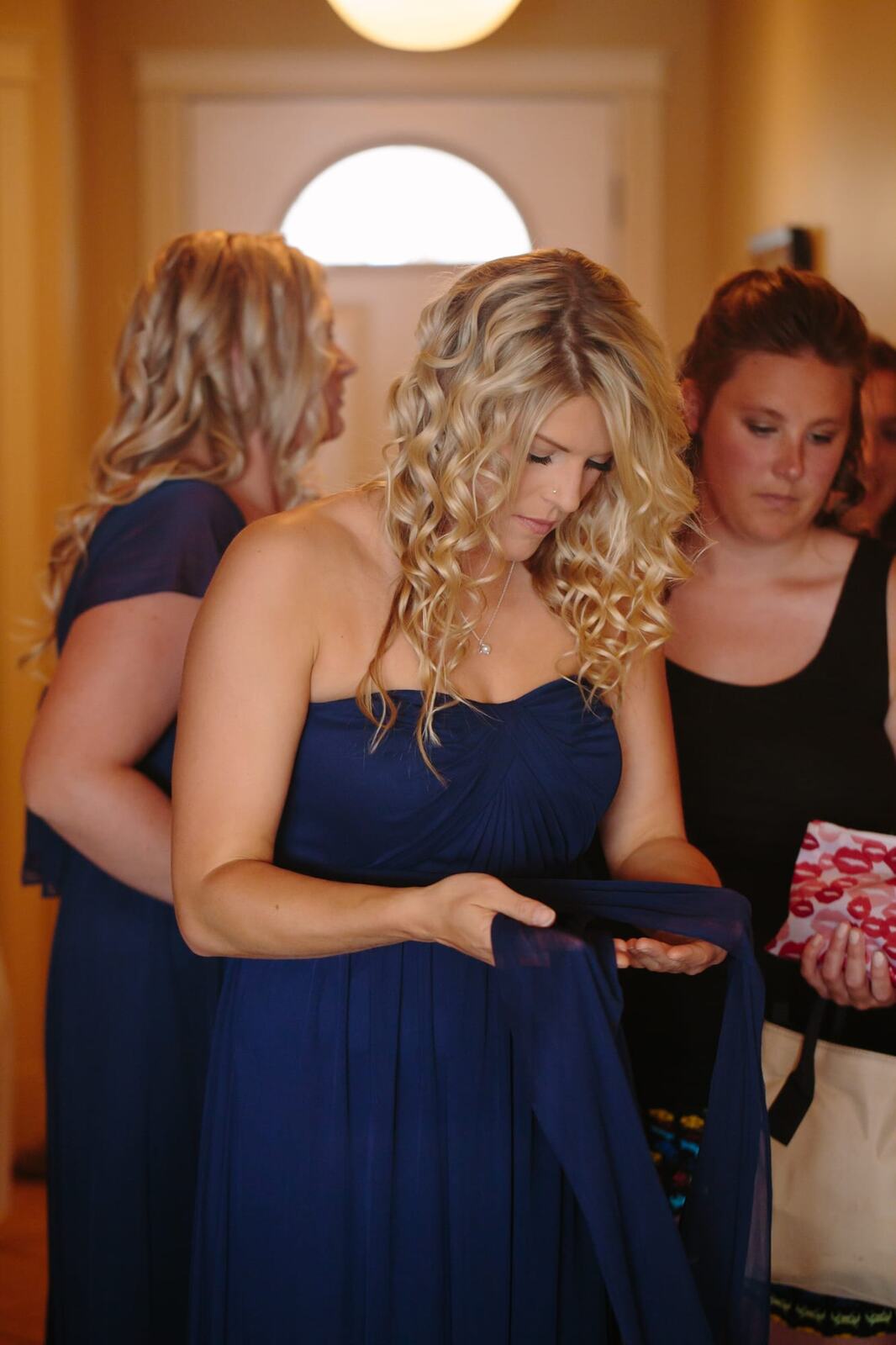 Tia and Matt weddings story frame 3: A Mabel Lake Airpark wedding in the North Okanagan, with grass-runway scenery, mountain openness and a warm end-of-night invitation..