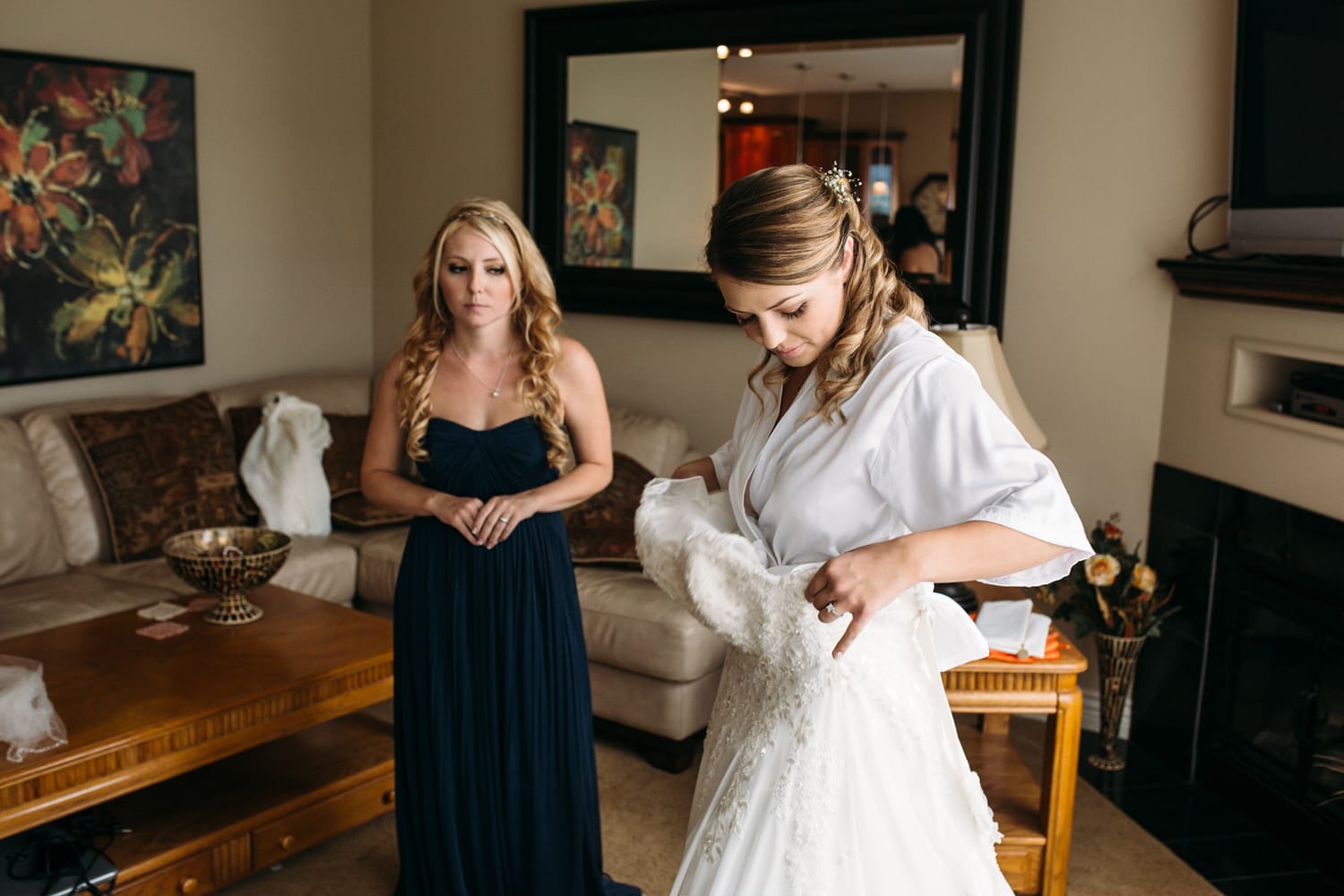 Tia and Matt weddings story frame 4: A Mabel Lake Airpark wedding in the North Okanagan, with grass-runway scenery, mountain openness and a warm end-of-night invitation..