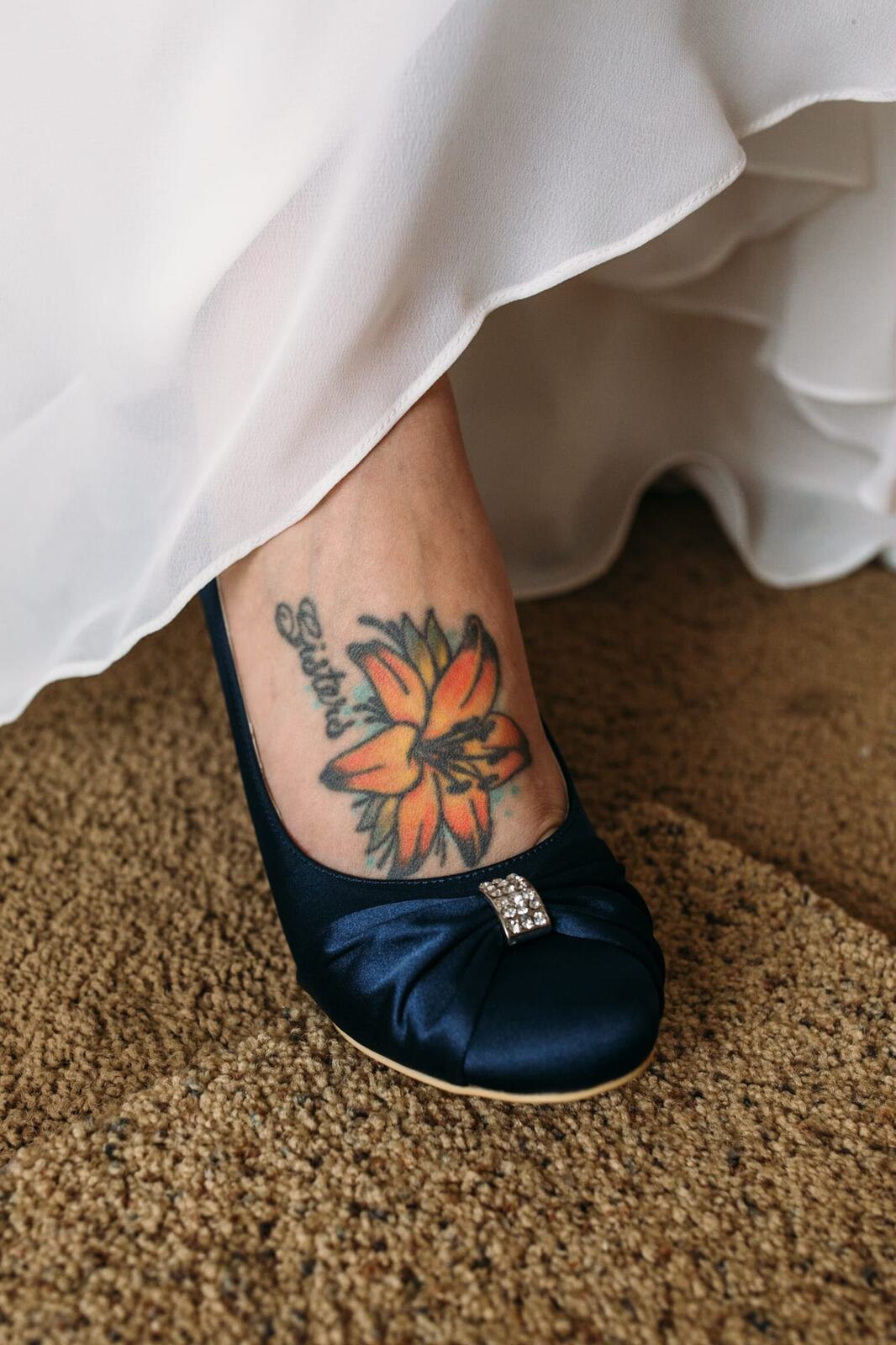 Tia and Matt weddings story frame 6: A Mabel Lake Airpark wedding in the North Okanagan, with grass-runway scenery, mountain openness and a warm end-of-night invitation..