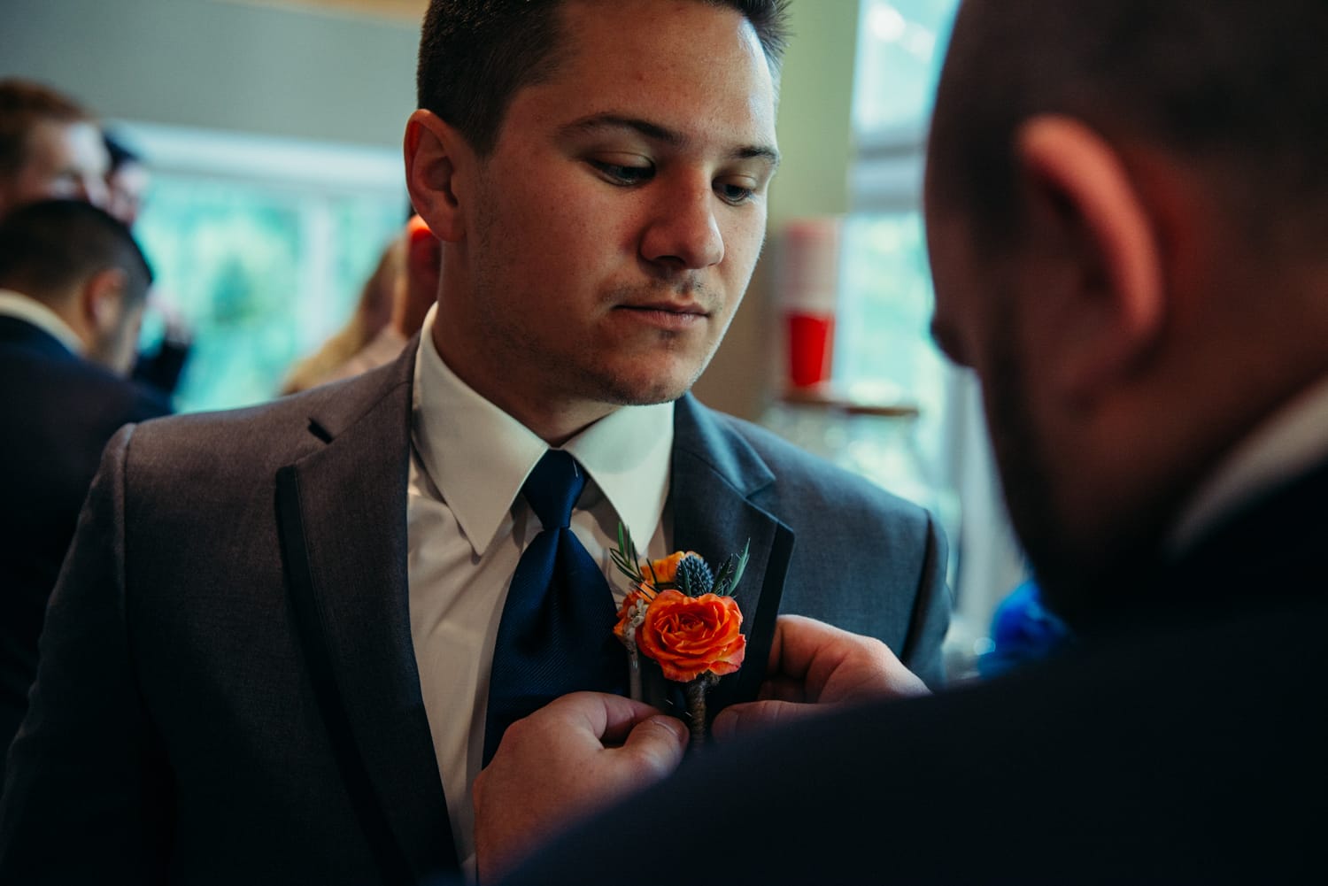 Tia and Matt weddings story frame 10: A Mabel Lake Airpark wedding in the North Okanagan, with grass-runway scenery, mountain openness and a warm end-of-night invitation..