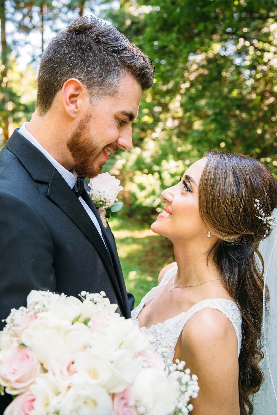 Vesta and Chris weddings story frame 9: A West Vancouver wedding at Capilano Golf and Country Club, with Iranian and Scottish family details, formal club atmosphere, dresses and kilts..