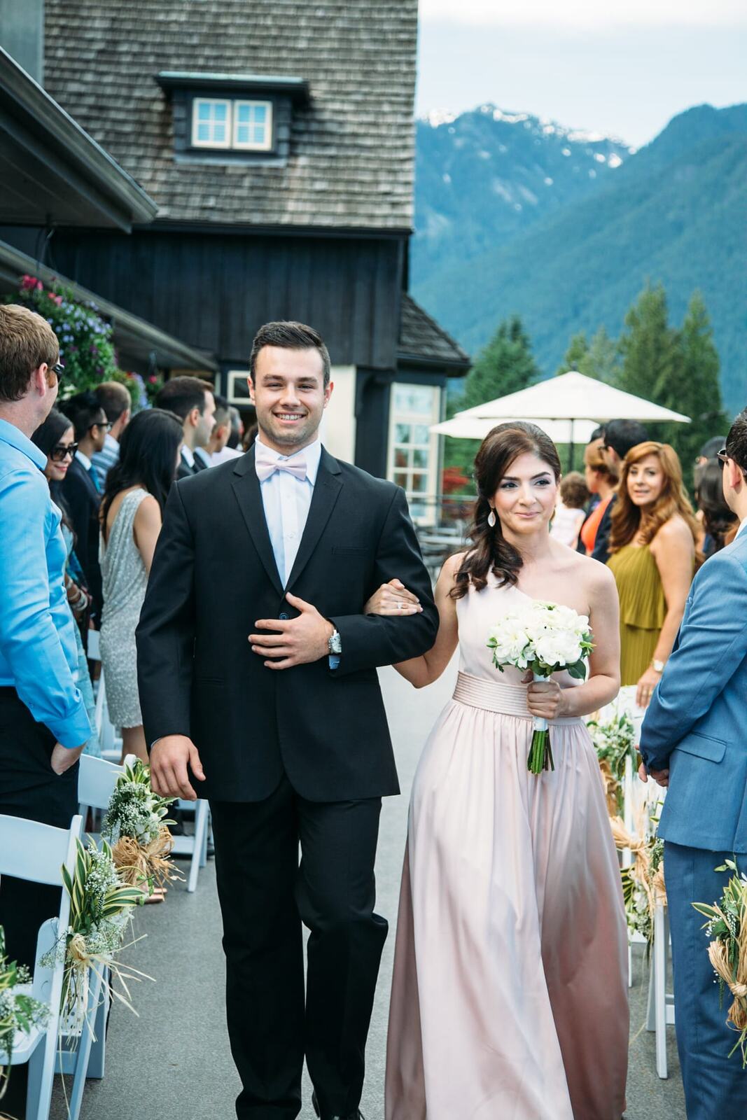 Vesta and Chris weddings story frame 15: A West Vancouver wedding at Capilano Golf and Country Club, with Iranian and Scottish family details, formal club atmosphere, dresses and kilts..