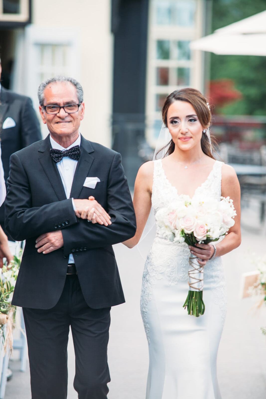 Vesta and Chris weddings story frame 16: A West Vancouver wedding at Capilano Golf and Country Club, with Iranian and Scottish family details, formal club atmosphere, dresses and kilts..