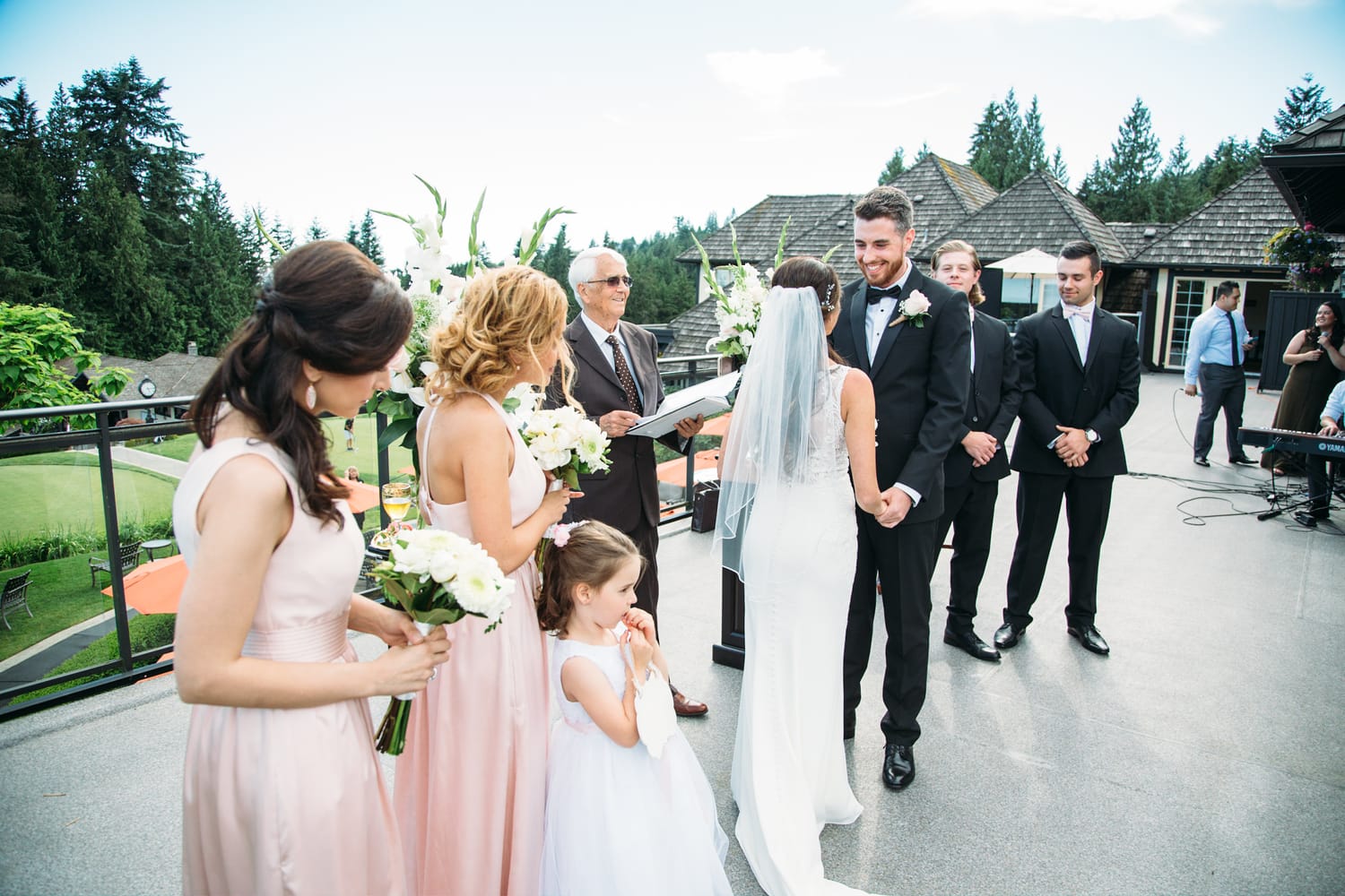 Vesta and Chris weddings story frame 17: A West Vancouver wedding at Capilano Golf and Country Club, with Iranian and Scottish family details, formal club atmosphere, dresses and kilts..